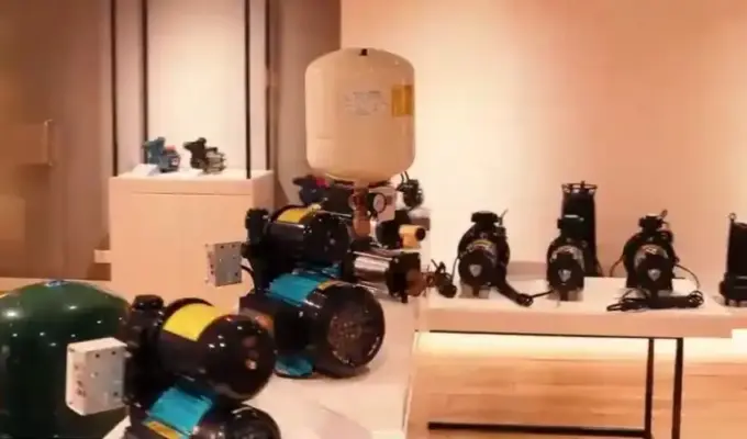Dharani Pumps and Motors showroom displaying industrial water pumps, pressure booster systems, and pumping equipment in Coimbatore